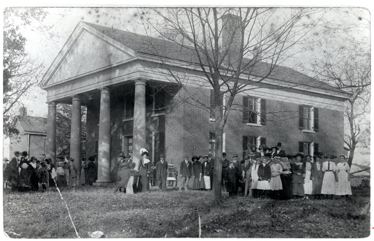 Historic photograph of Goochland Courthouse with people gathered outside